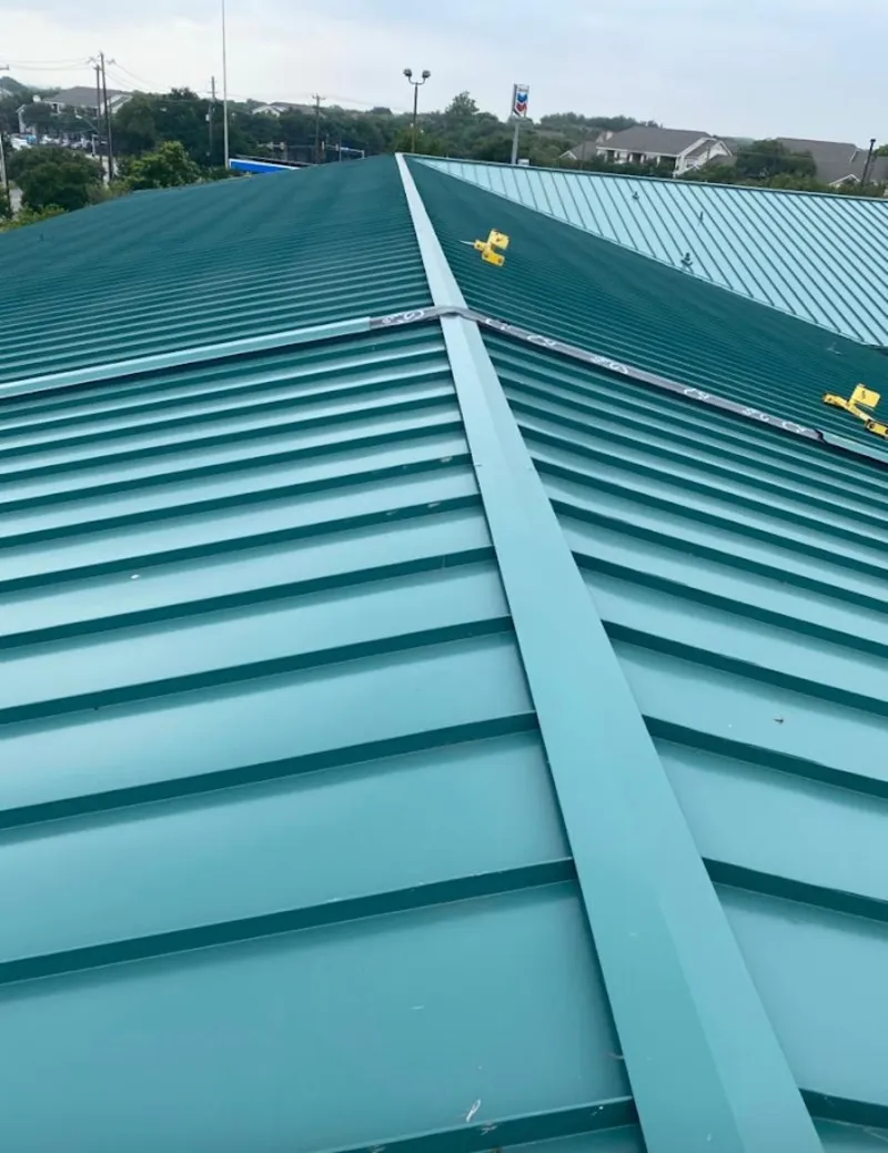 Green commercial metal roof ridge and valley for Metal Roof Repair in Boerne